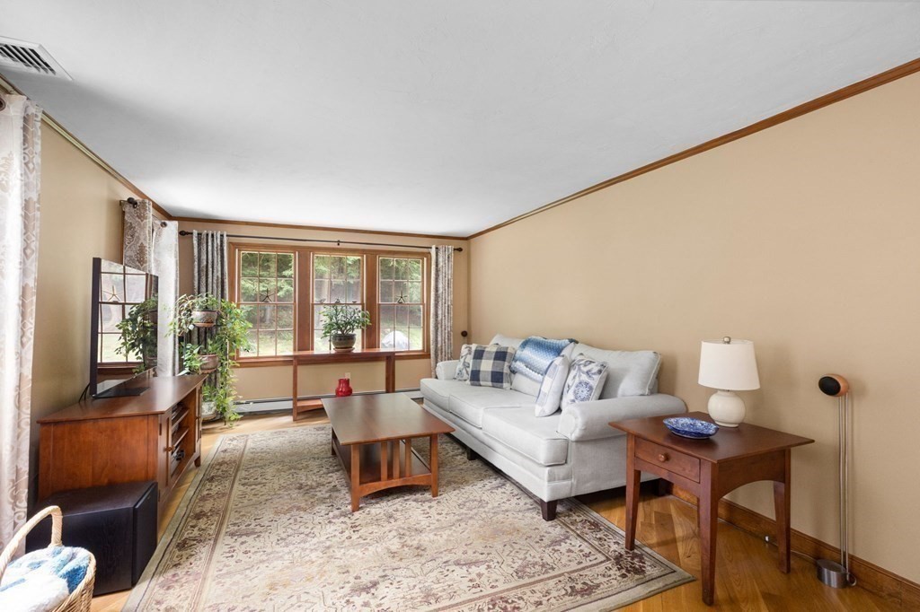 271 Pine Street Marshfield, MA 02050 - Photo 15 of 41 a living room with furniture and a flat screen tv