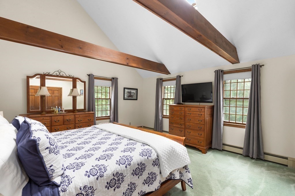 271 Pine Street Marshfield, MA 02050 - Photo 22 of 41 a bedroom with a large bed and a large window