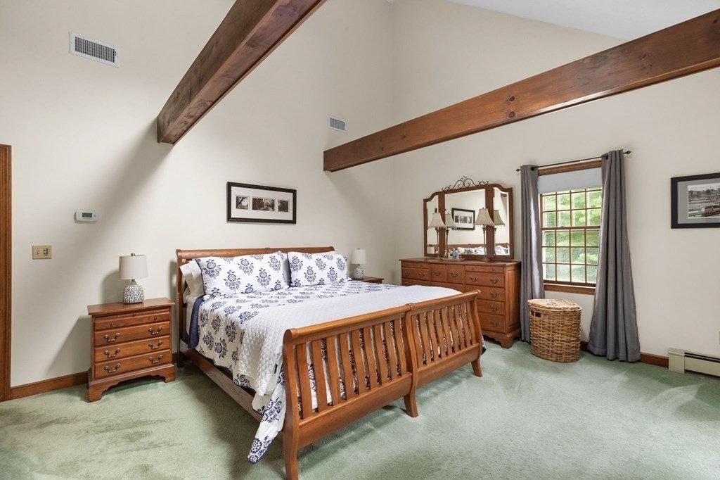 271 Pine Street Marshfield, MA 02050 - Photo 24 of 41 a bedroom with a bed lamp and a window