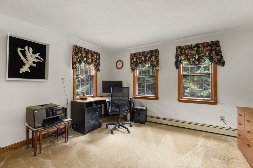 271 Pine Street Marshfield, MA 02050 - Photo 27 of 41 a view of a workspace with lounge chair and a window