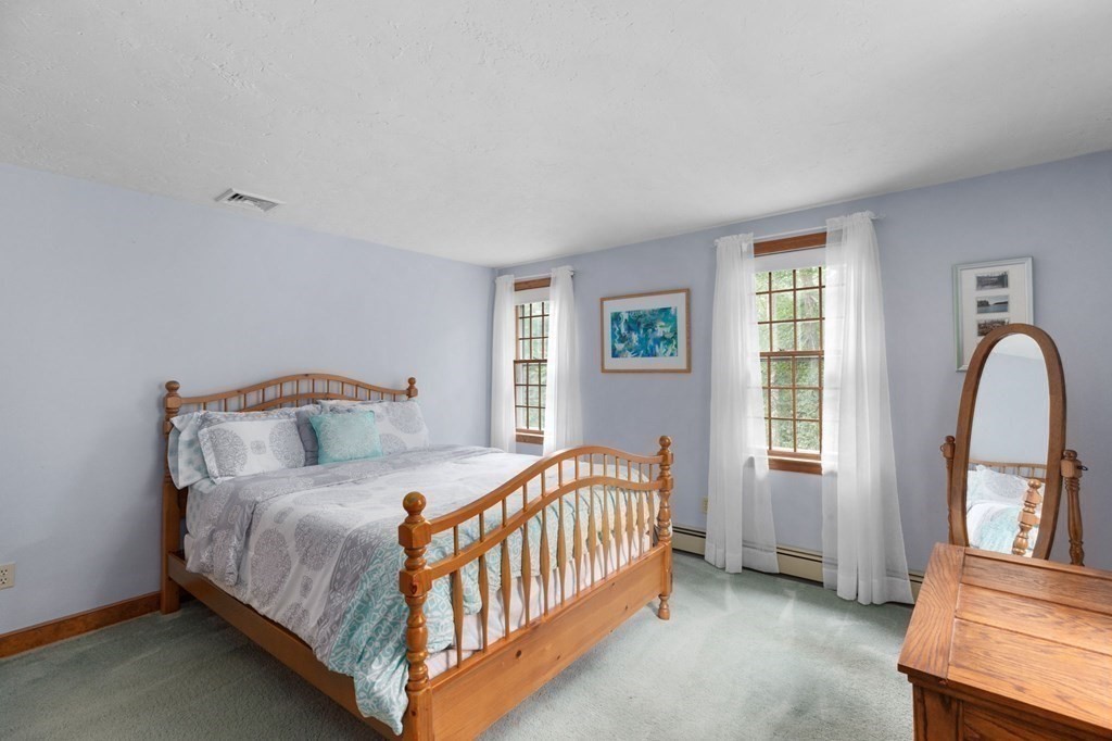 271 Pine Street Marshfield, MA 02050 - Photo 29 of 41 a bedroom with a bed next to a window