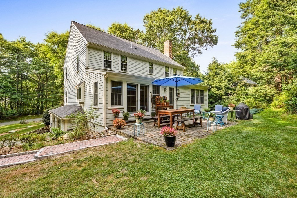 271 Pine Street Marshfield, MA 02050 - Photo 31 of 41 a front view of a house with sitting area and garden