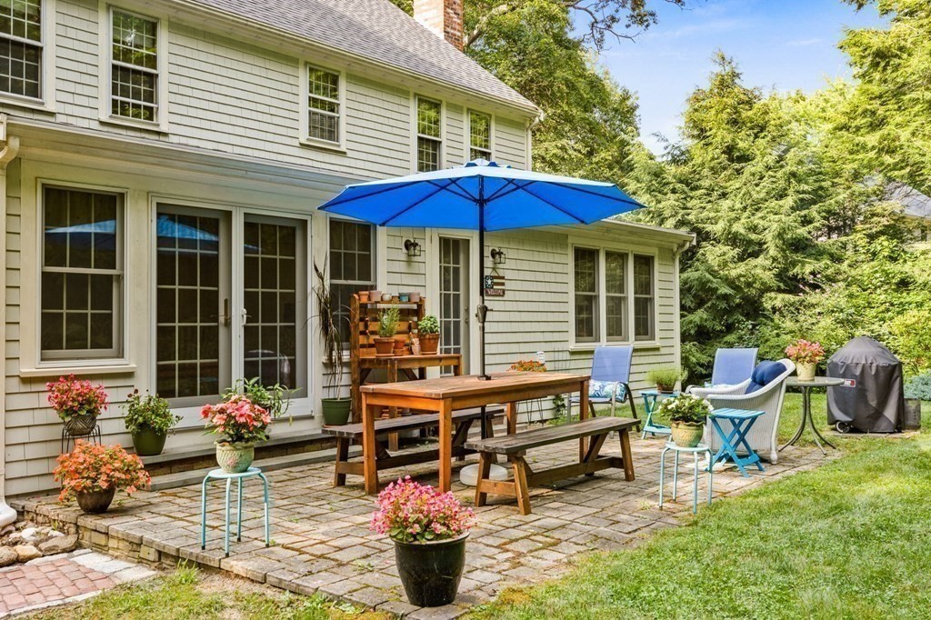 271 Pine Street Marshfield, MA 02050 - Photo 32 of 41 a view of a chairs and table in patio of the house