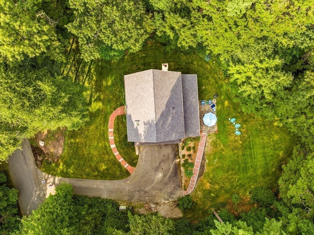 271 Pine Street Marshfield, MA 02050 - Photo 38 of 41 an aerial view of a house with a yard and trees all around