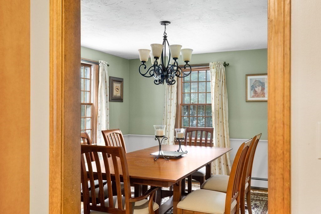 271 Pine Street Marshfield, MA 02050 - Photo 9 of 41 a view of a dining room with furniture and chandelier