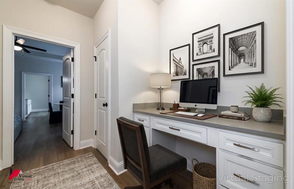 331 Hummingbird Lane Princeton, LA 71067 - Photo 22 of 34 AI Virtually added some staging. Home office with dark wood-style flooring, built in study area, and ceiling fan