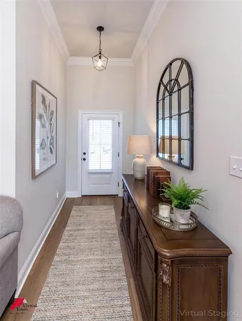 a lobby with furniture and window