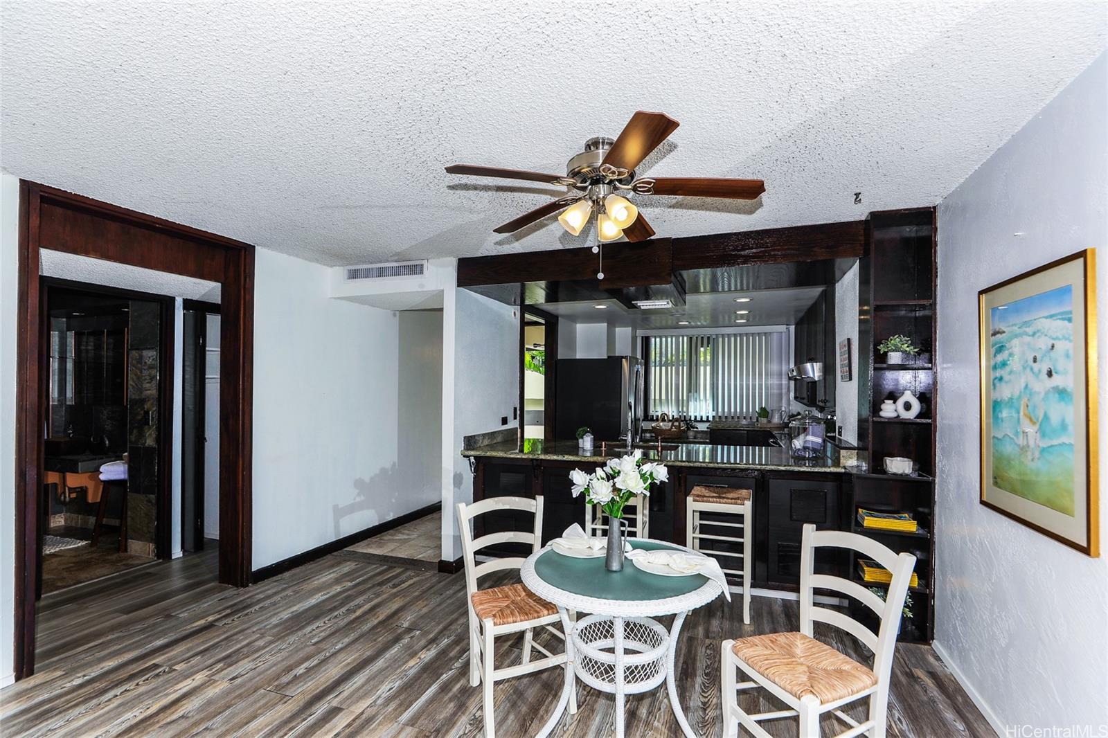 500 Lunalilo Home Road, Unit 22H Honolulu, HI 96825 - Photo 6 of 25 Dining to kitchen!