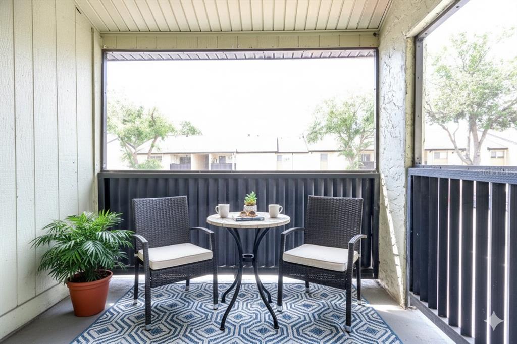 922 Lake Destiny Road, Unit E Altamonte Springs, FL 32714 - Photo 9 of 24 a view of a outdoor seating area with furniture
