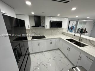 Flagami Miami, FL 33126 - Photo 3 of 13 a kitchen with a sink stainless steel appliances and cabinets