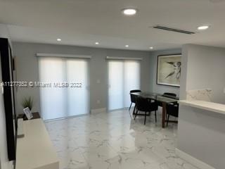 Flagami Miami, FL 33126 - Photo 8 of 13 a view of a big room with lounge chair and windows