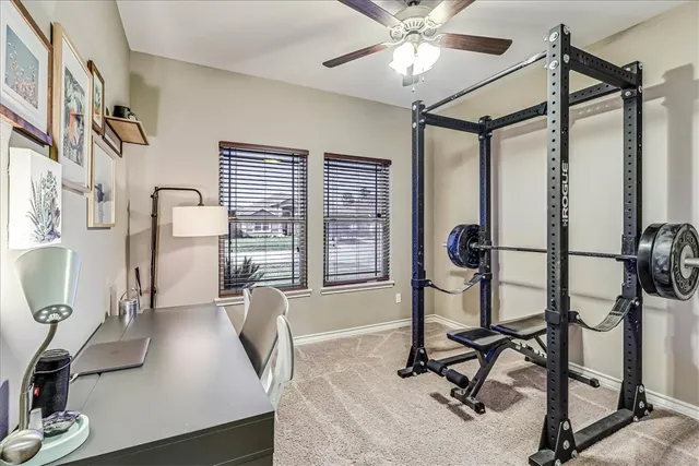 a view of a livingroom with furniture and windows