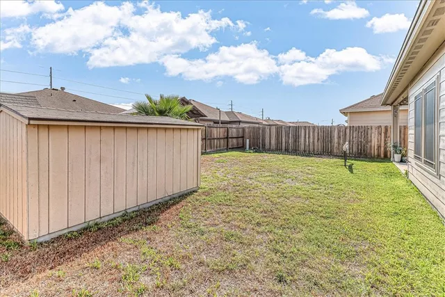 a view of a backyard with a garden