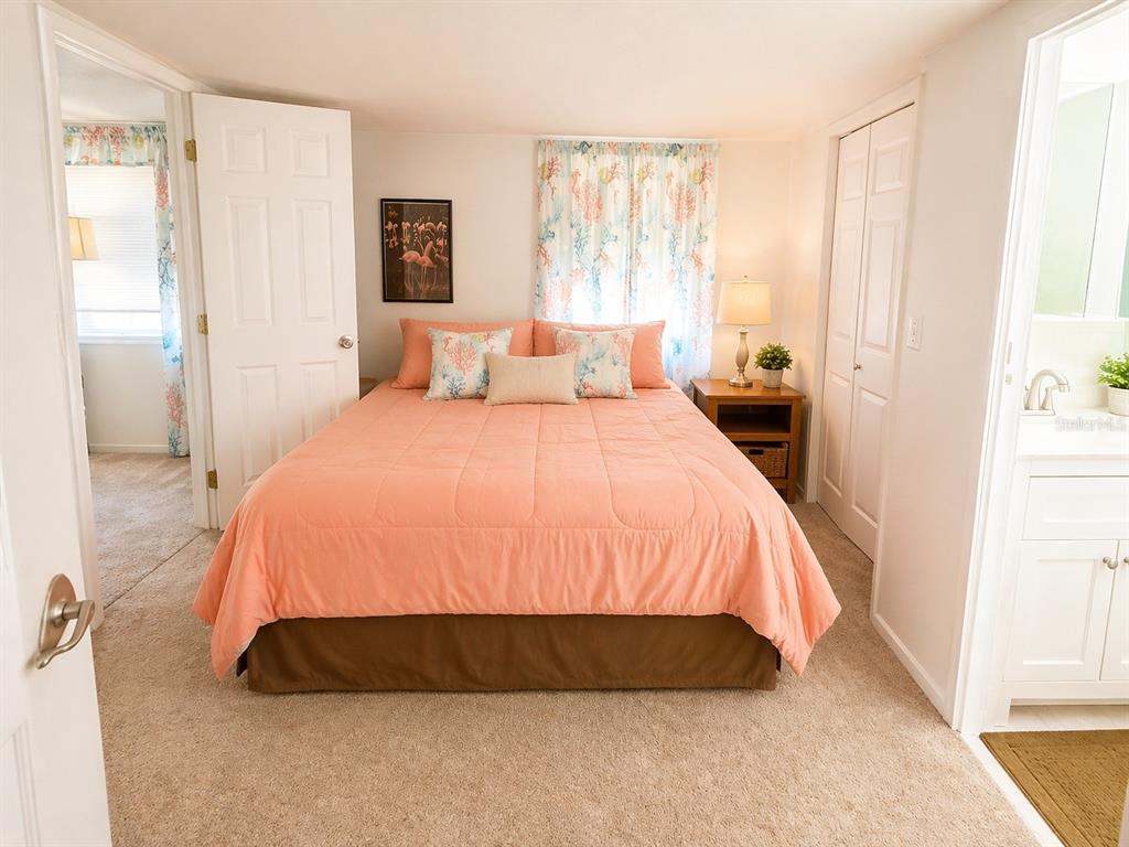 6618 Oregon Street Bradenton, FL 34207 - Photo 12 of 35 a bedroom with a bed and window