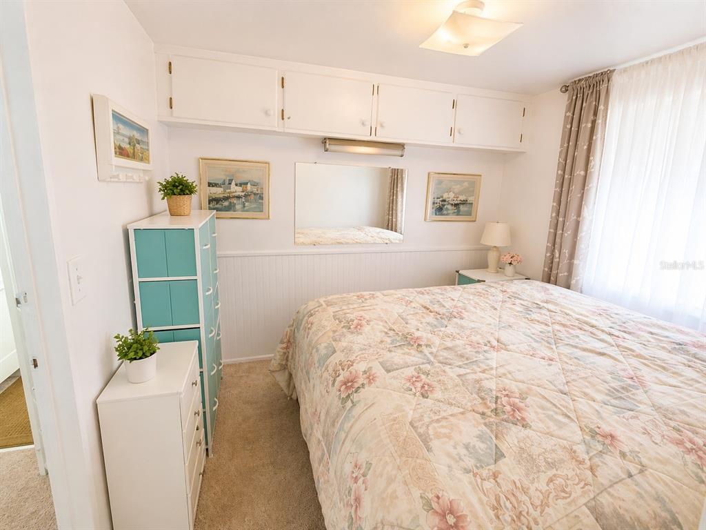 6618 Oregon Street Bradenton, FL 34207 - Photo 14 of 35 a bedroom with a bed and a window
