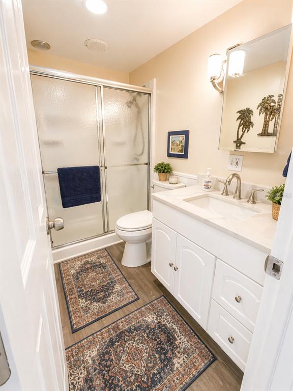 6618 Oregon Street Bradenton, FL 34207 - Photo 15 of 35 a bathroom with a sink toilet and shower