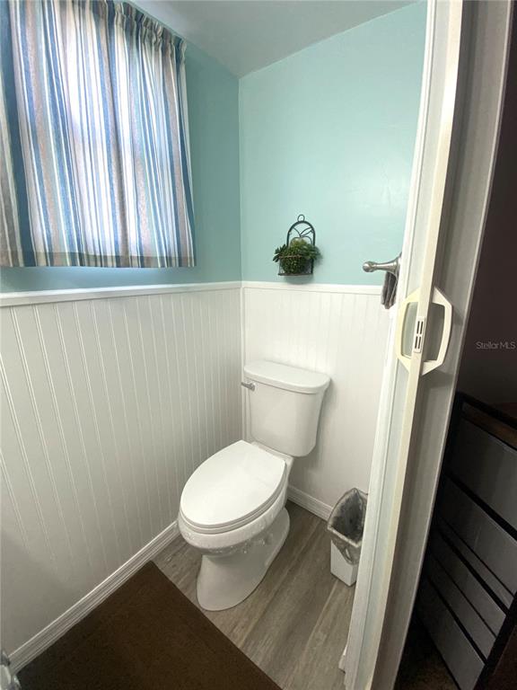 6618 Oregon Street Bradenton, FL 34207 - Photo 29 of 43 a bathroom with a toilet and a sink