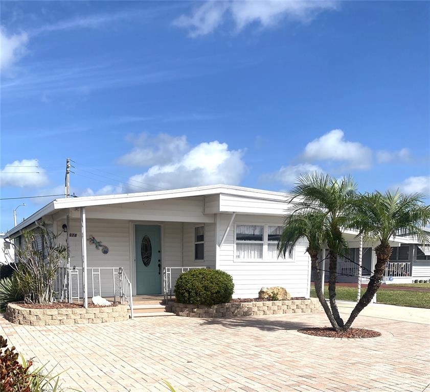 6618 Oregon Street Bradenton, FL 34207 - Photo 40 of 43 a view of a house with a patio