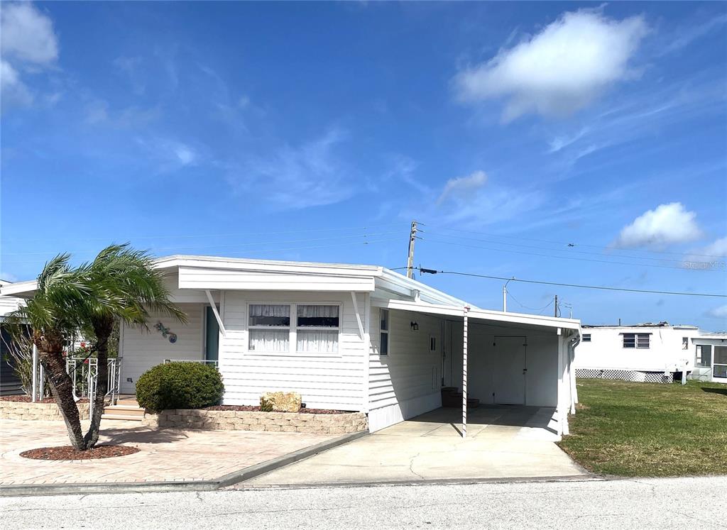 6618 Oregon Street Bradenton, FL 34207 - Photo 41 of 43 a view of a house with a patio