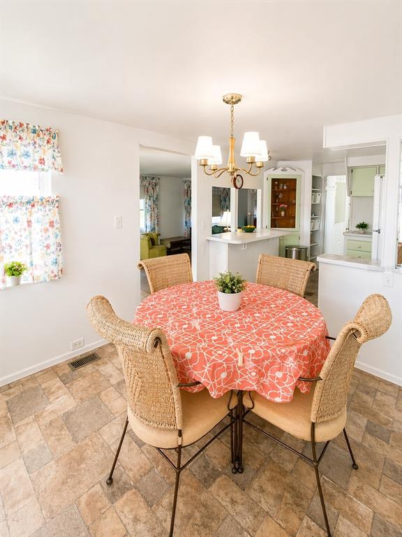 6618 Oregon Street Bradenton, FL 34207 - Photo 8 of 35 a view of a dining room with furniture