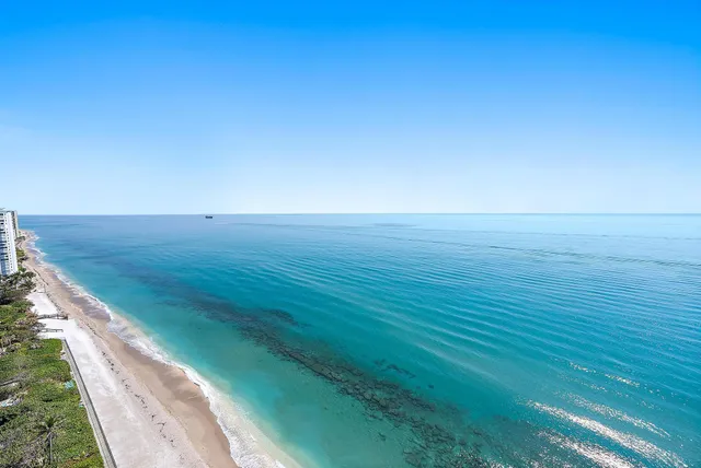 a bedroom with a bed and dresser