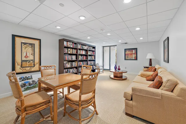 a room with gym equipment and windows