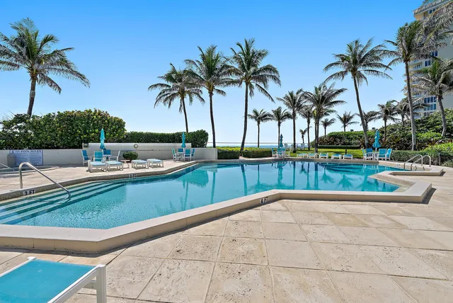 swimming pool with outdoor seating