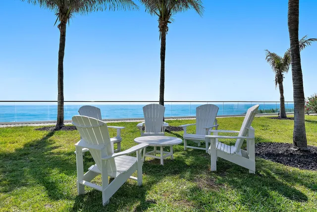 a view of a lake with a big yard