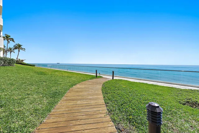 a view of balcony with wooden floor