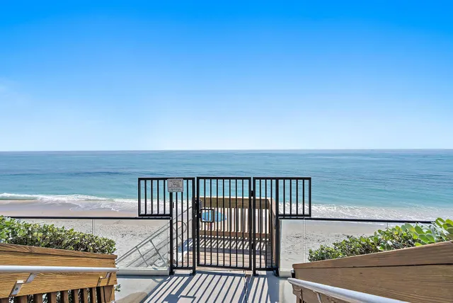 a terrace of a house with outdoor seating