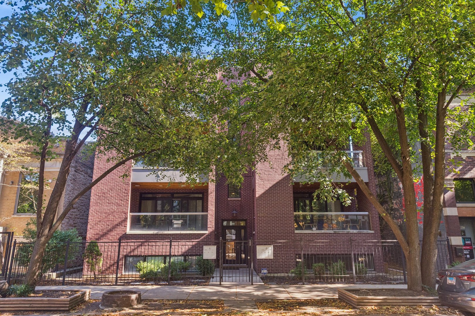 1011 North Wolcott Avenue, Unit 2N Chicago, IL 60622 - Photo 1 of 23 a front view of a house with garden