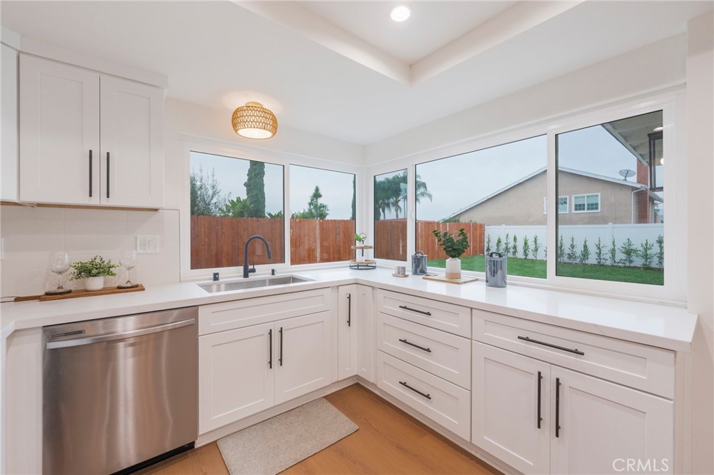 431 Devonshire Drive Brea, CA 92821 - Photo 13 of 45 a kitchen with a sink cabinets and window