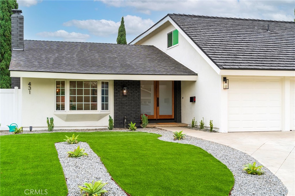 431 Devonshire Drive Brea, CA 92821 - Photo 2 of 45 a front view of a house with a yard