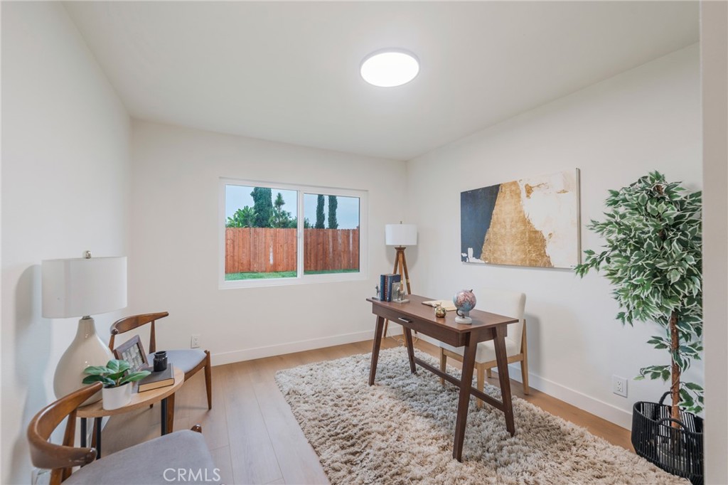 431 Devonshire Drive Brea, CA 92821 - Photo 23 of 45 a living room with furniture and a potted plant