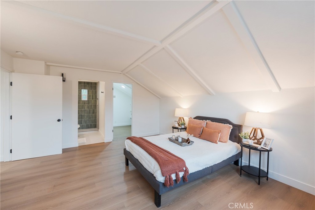 431 Devonshire Drive Brea, CA 92821 - Photo 29 of 45 a bedroom with a bed and wooden floor