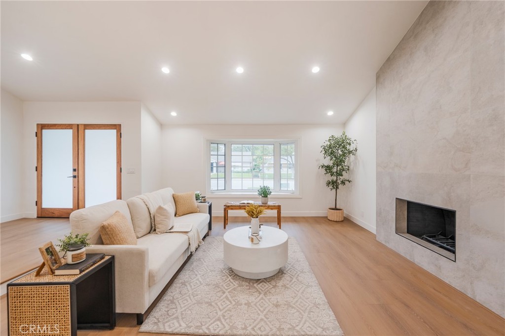 431 Devonshire Drive Brea, CA 92821 - Photo 3 of 45 a living room with furniture and a fireplace