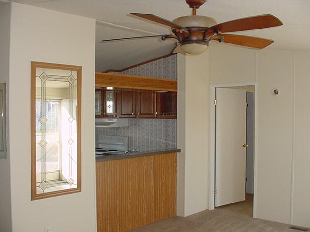11404 Custer Road Arizona City, AZ 85123 - Photo 8 of 21 Kitchen overlooks the Living Room