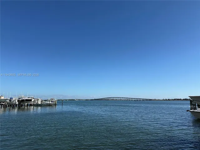 a view of ocean with boats