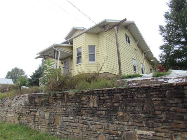 1688 Pitt Street Jennerstown, PA 15547 - Photo 5 of 23 a view of a house with a yard