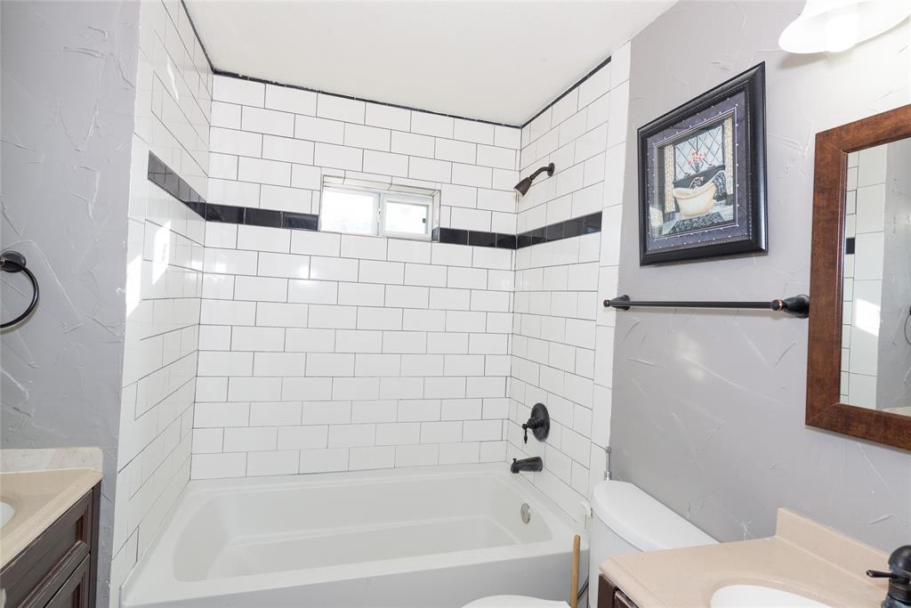 4405 Ray White Road, Unit A Fort Worth, TX 76244 - Photo 12 of 20 a bathroom with a bathtub and shower