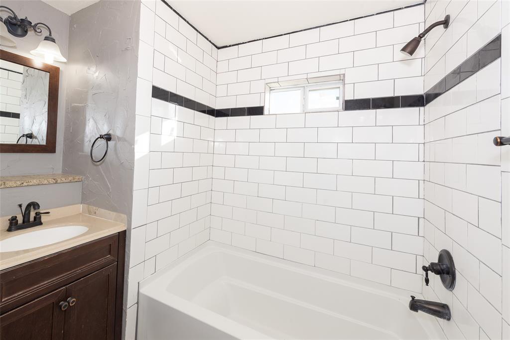 4405 Ray White Road, Unit A Fort Worth, TX 76244 - Photo 14 of 20 a bathroom with a shower and a sink