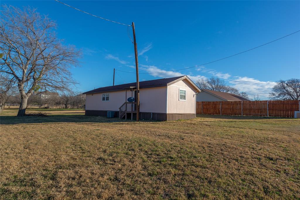 4405 Ray White Road, Unit A Fort Worth, TX 76244 - Photo 19 of 20 a view of a house with a yard