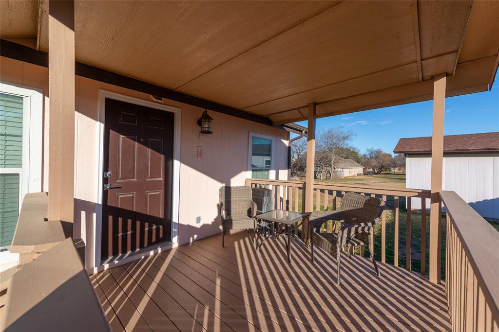 4405 Ray White Road, Unit A Fort Worth, TX 76244 - Photo 3 of 20 a view of balcony with wooden floor