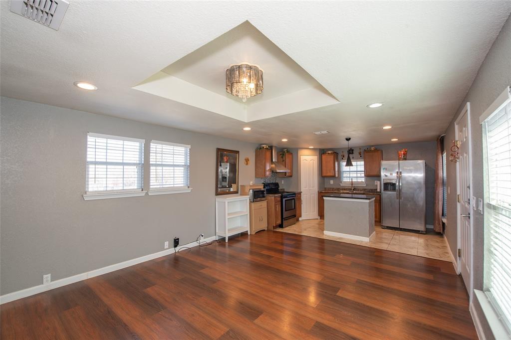 4405 Ray White Road, Unit A Fort Worth, TX 76244 - Photo 20 of 20 a view of a kitchen with a sink and wooden floor