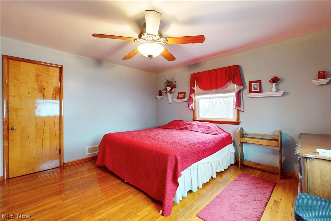 391 Canton Road Steubenville, OH 43953 - Photo 19 of 40 Bedroom featuring light wood-style flooring and ceiling fan