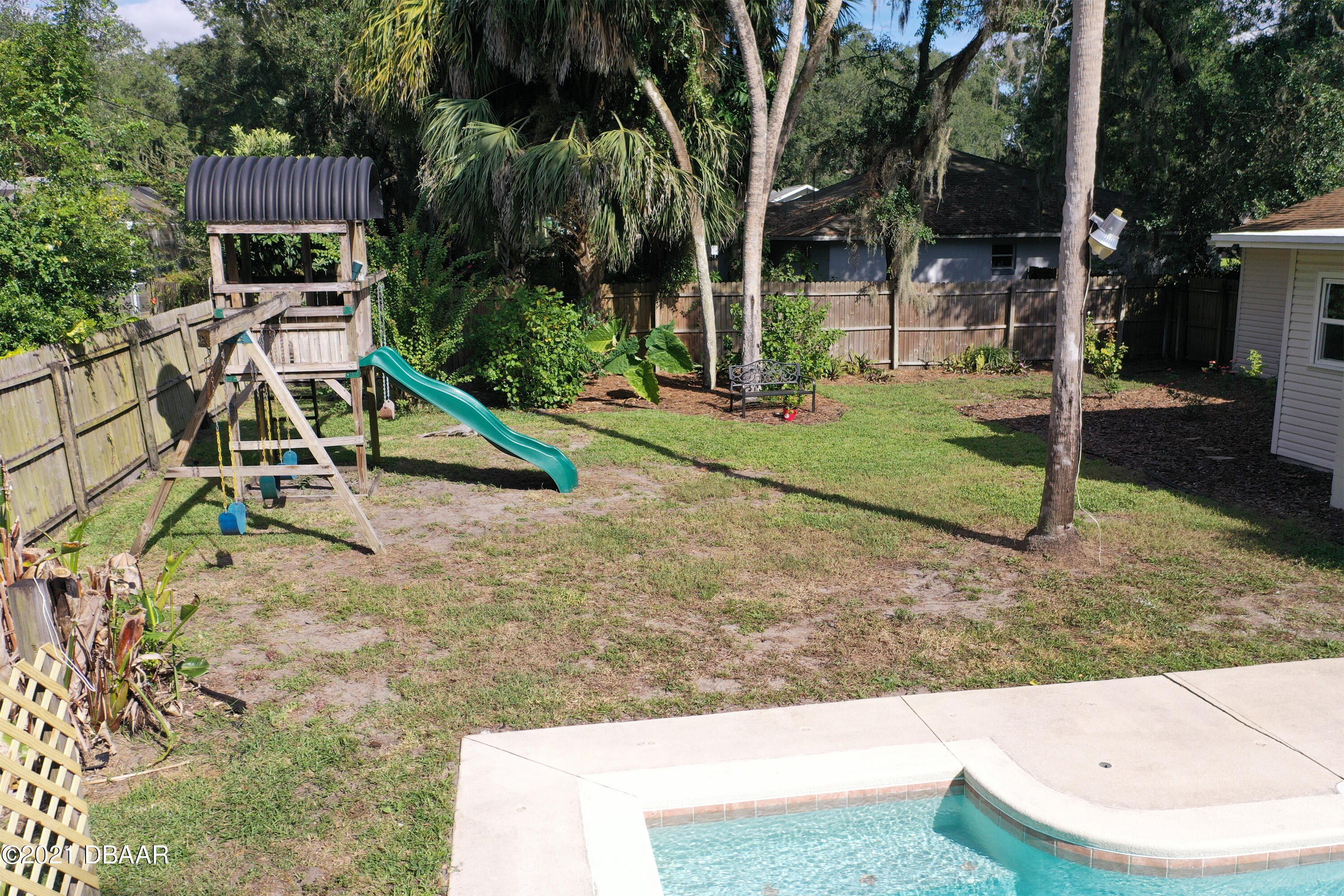 1522 Pine Tree Drive Edgewater, FL 32132 - Photo 17 of 26 a view of outdoor space yard deck and lake