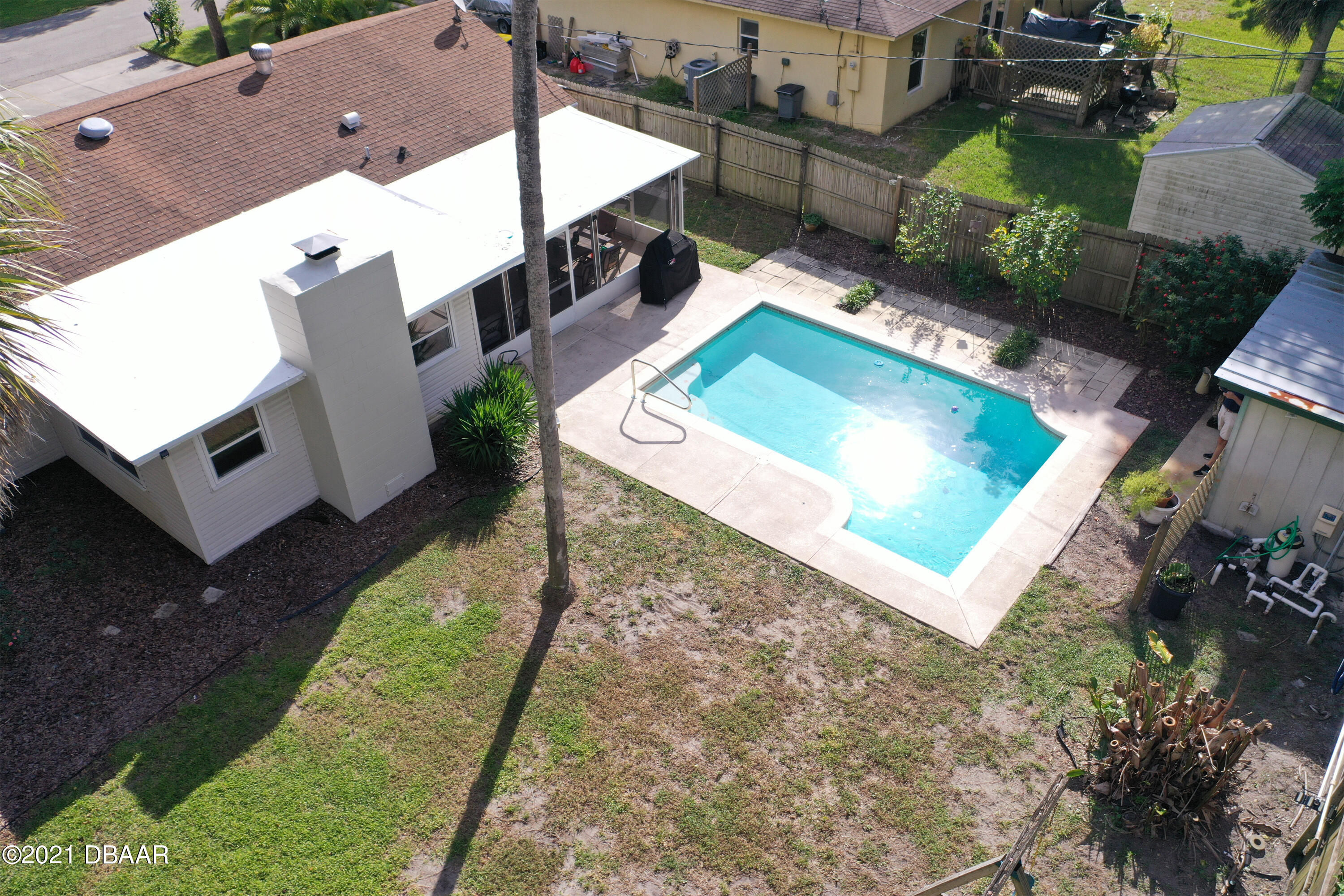1522 Pine Tree Drive Edgewater, FL 32132 - Photo 18 of 26 an aerial view of a house with a garden and mountain view