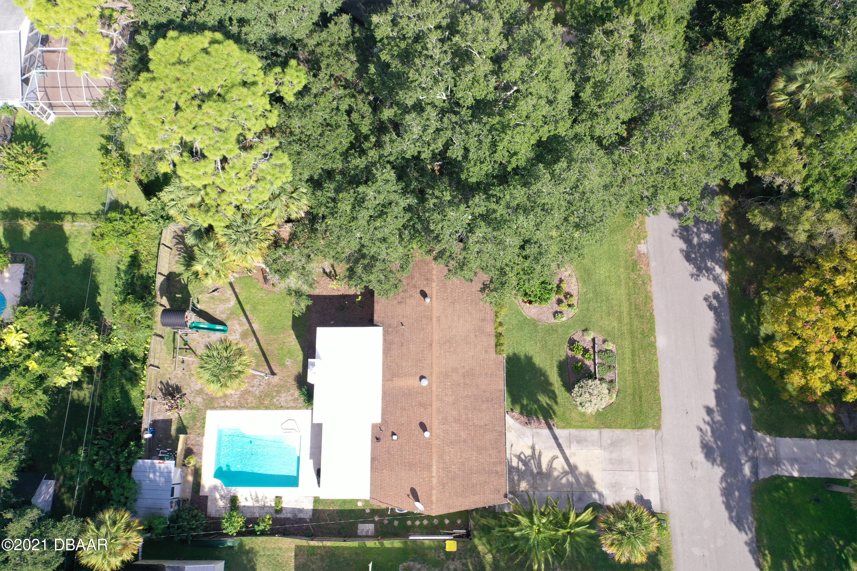 1522 Pine Tree Drive Edgewater, FL 32132 - Photo 20 of 26 an aerial view of a house with a yard