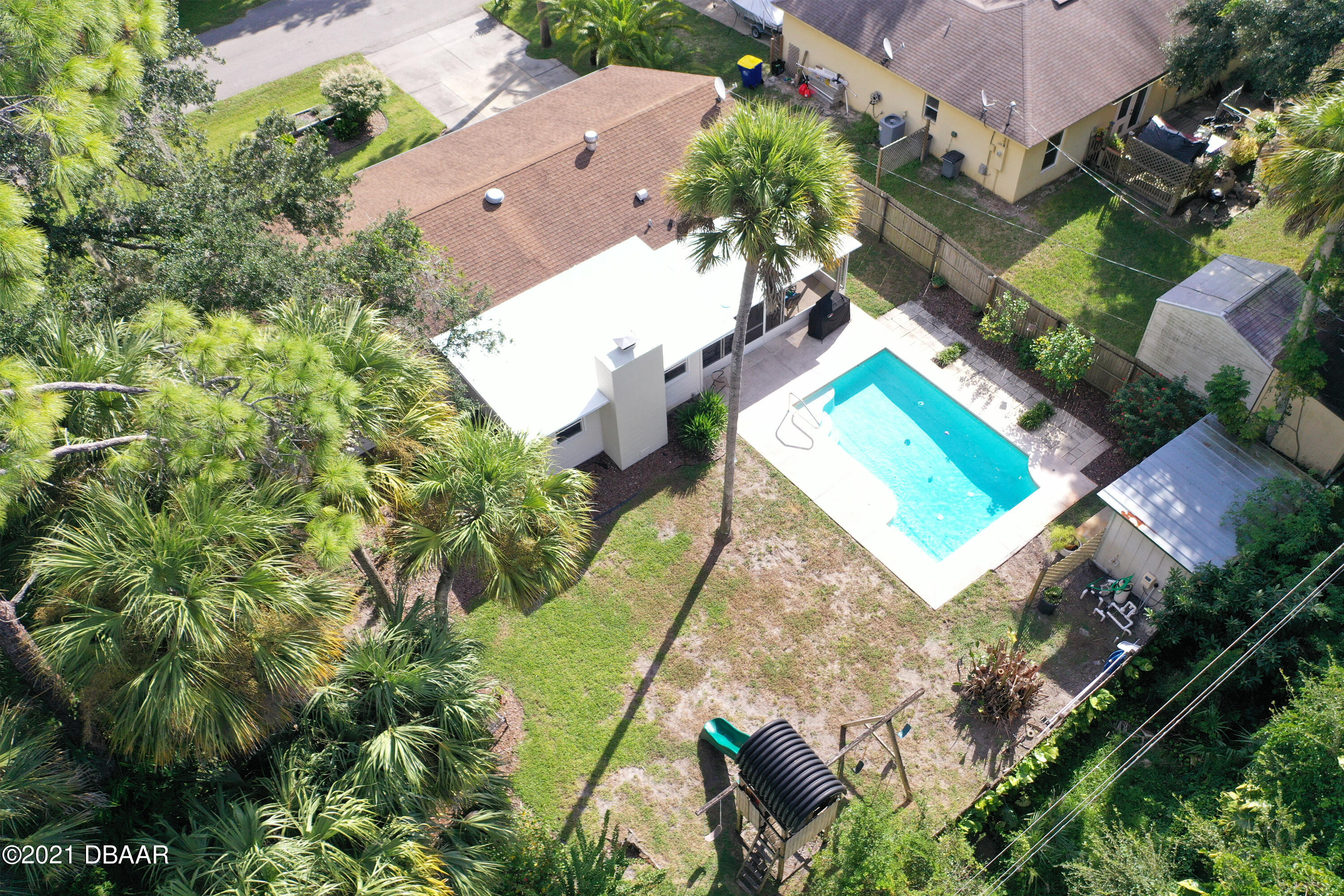 1522 Pine Tree Drive Edgewater, FL 32132 - Photo 25 of 26 an aerial view of a house with a yard and garden