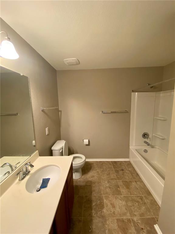 6412 Garden Rose Path Austin, TX 78754 - Photo 11 of 15 a bathroom with a bathtub and a sink